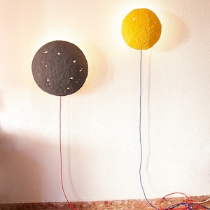 Plug in yellow Sconce Lamp Eclipse made of paper mache