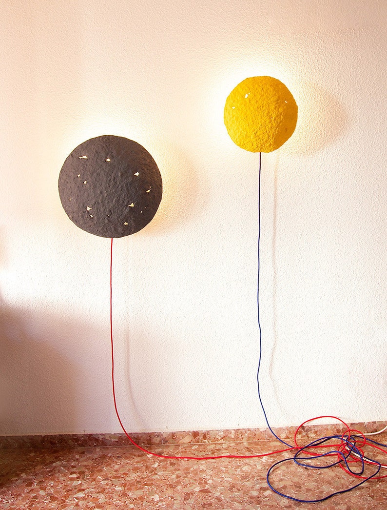 Plug in yellow Sconce Lamp Eclipse made of paper mache