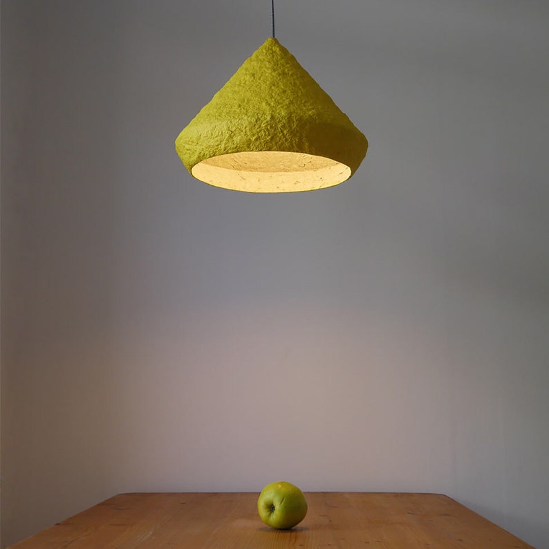 Industrial yellow Lighting above Kitchen Island made with paper