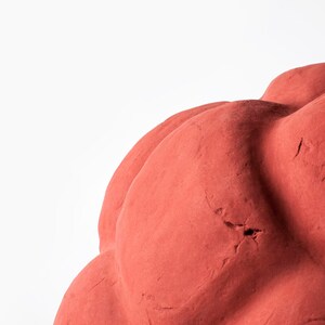 detail of sculptural red Pendant Light made from Paper Mache called Sensi