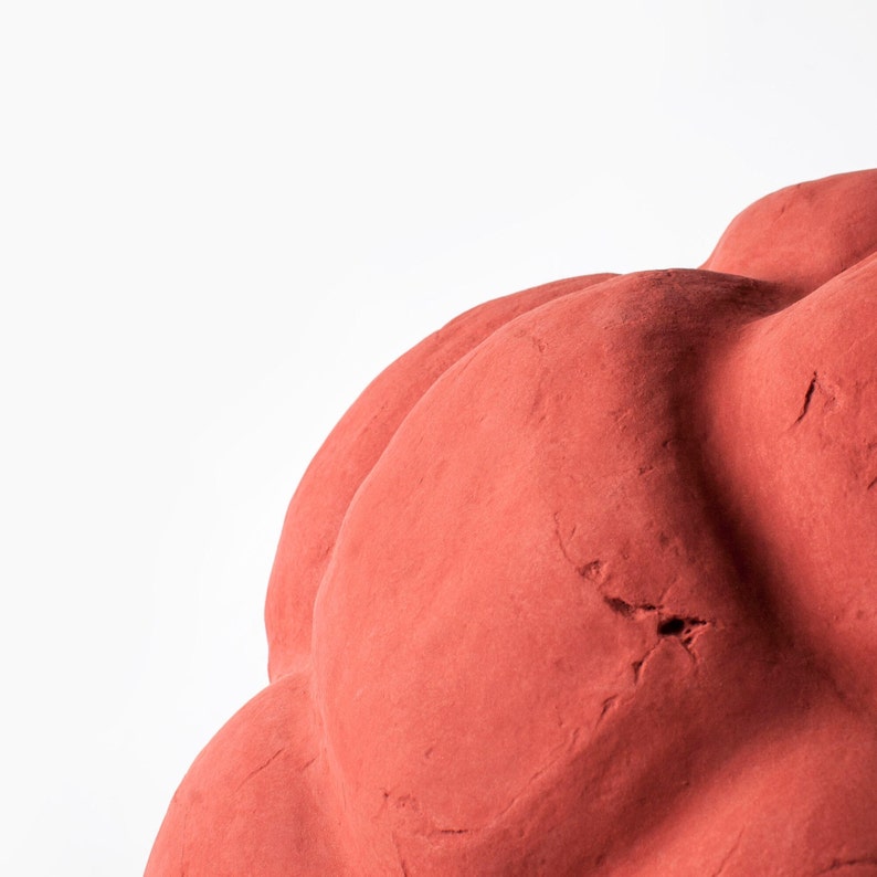 detail of sculptural red Pendant Light made from Paper Mache called Sensi