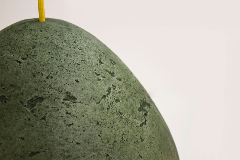 detail of Modern green Pendant Light made of paper mache
