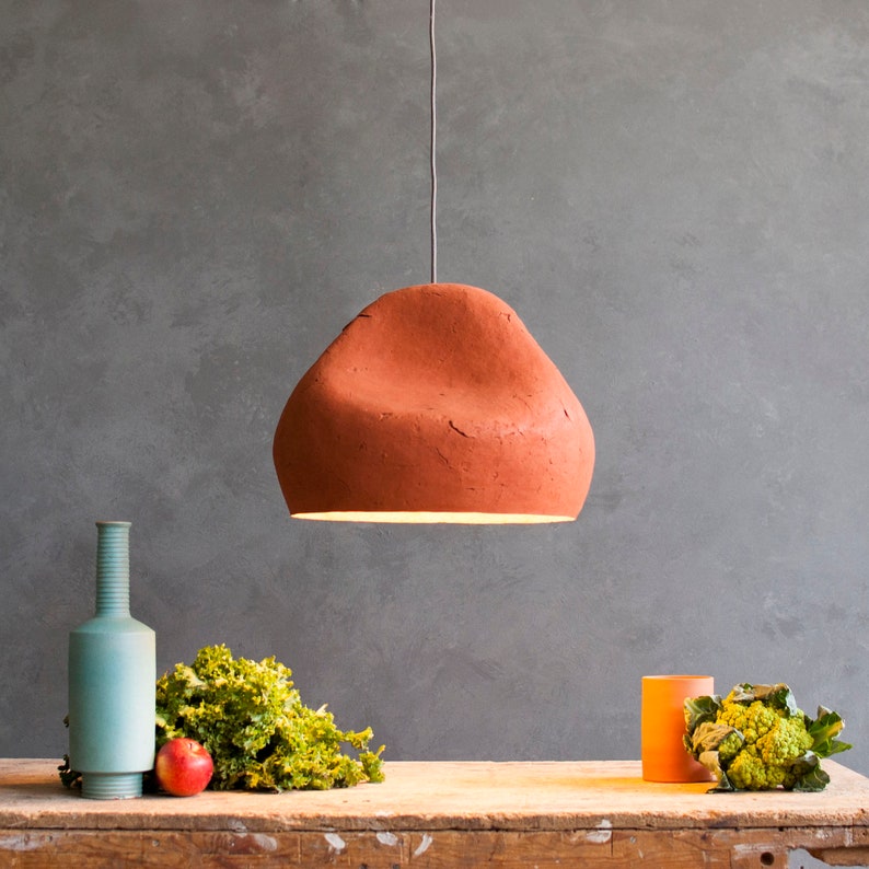 Paper Mache Light Sculpture Sensi in the dining room