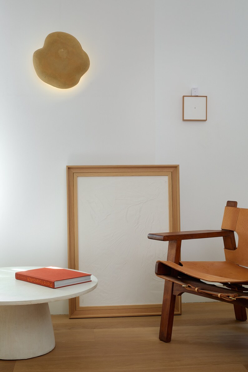 yellow Wall Lamp in living room made of papier mache