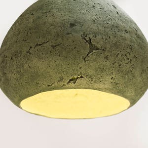 detail of Modern green Pendant Light made of paper mache