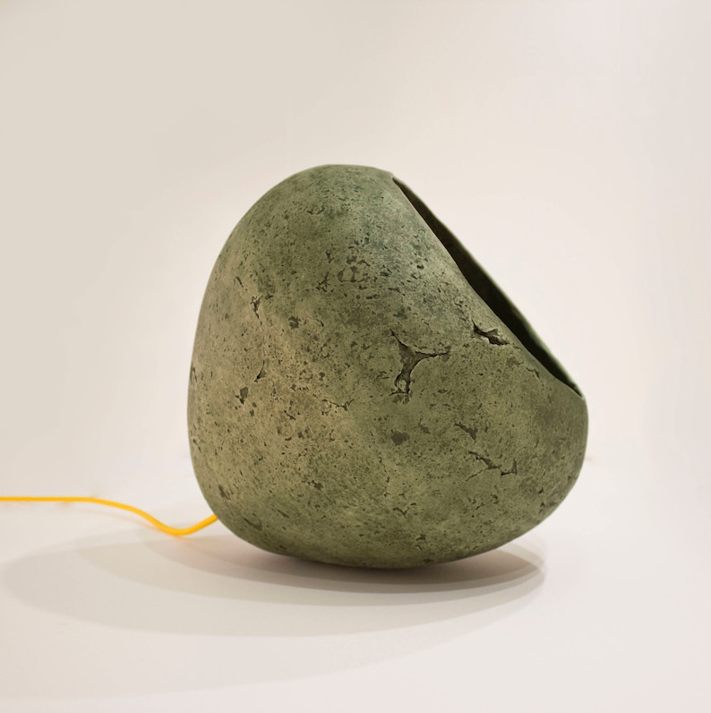 detail of Modern green Pendant Light made of paper mache