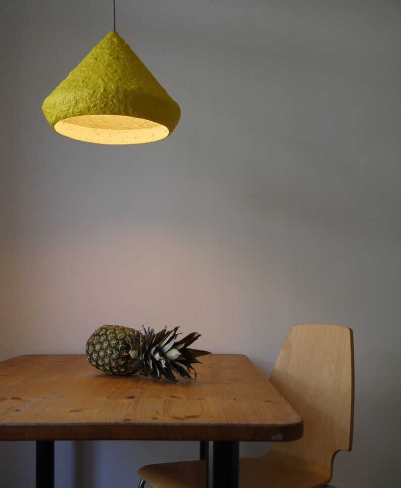 Industrial yellow Lighting above Kitchen table made with paper