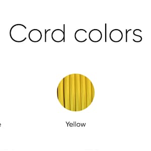May include: Image displaying three circular samples of cords in different colors. The text "Cord colors" is at the top. The cord colors are cotton white, yellow, and red, each labeled below their respective sample.