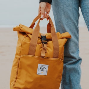 The Everyday Recycled Roll-Top Backpack in Mustard college bag, school bag, backpack, travel bag, mens bag, ladies bag, cabin bag image 2
