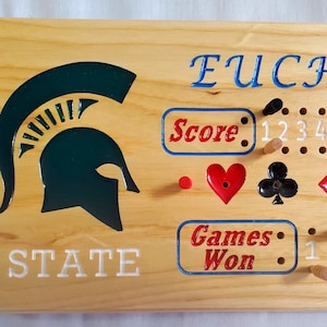 Michigan State Euchre Board with storable pegs, Simple way to keep score is with this Euchre Board