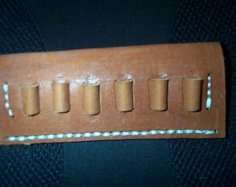 One Leather Cartridge Belt slide holders, .22 s,.223, .30cal, .45-70, 20 ga, 16 ga and 12 ga