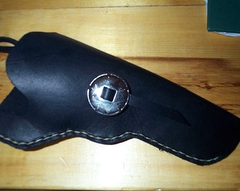 Black powder, right hand cross draw revolver holster