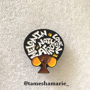 Soft enamel pin titled ”Afro Love”.