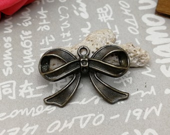 10/50 pièces métal bowknot noeud papillon pendentif collier boucle d'oreille porte-clés charme bijoux faits main bricolage trouver bronze antique couleur argent AM0550