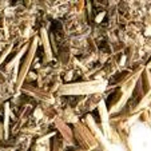 May include: A collection of dried botanical material consisting of small, light brown woody stems, fibrous bark fragments, and fine, textured plant matter. The mixture features varied earthy tones ranging from pale tan to deep brown throughout.