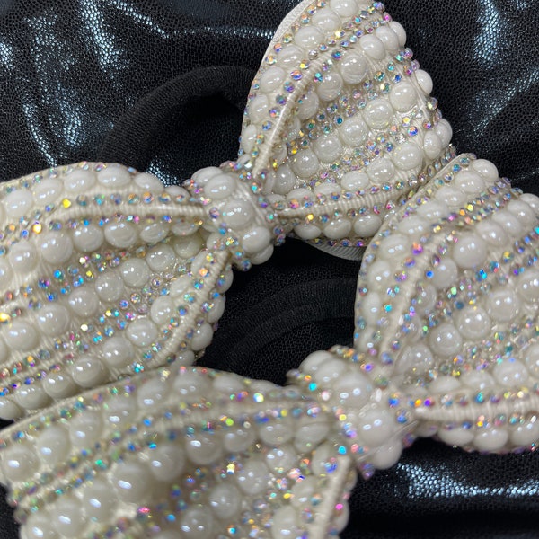 Tailless pigtail bows. Free gift with every purchase. Scrunchie or rhinestone ponytail cuff, gifts chosen at random.