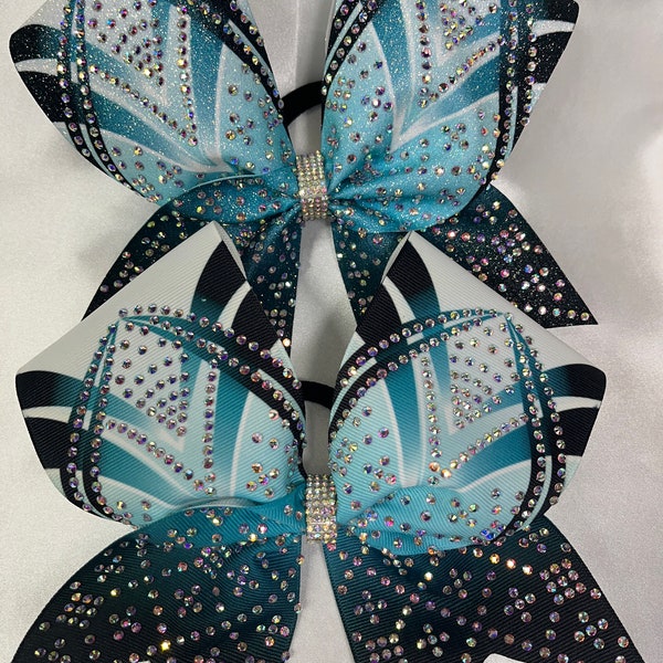 Cheerbow. Free gift with every purchase. Scrunchie or rhinestone ponytail cuff, gifts chosen at random.