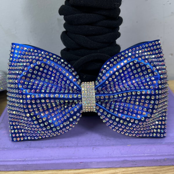 Metallic royal blue fabric tailless hairbow. Free gift with every purchase. Scrunchie or rhinestone ponytail cuff, gifts chosen at random.