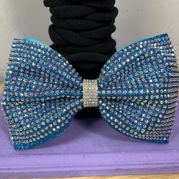 Aqua full glitter tailless hairbow. Free gift with every purchase. Scrunchie or rhinestone ponytail cuff, gifts chosen at random.