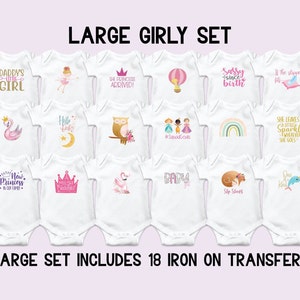 May include: Set of 18 iron-on transfers for baby onesies. The designs include a variety of cute and whimsical illustrations, such as a flamingo, a crown, a hot air balloon, and a narwhal. The text on the transfers includes phrases like "Daddy's Little Girl", "The Princess Arrived", "Sassy Since Birth", and "She Leaves a Sparkle Wherever She Goes".
