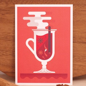 May include: A red and white illustration of a glass of mulled wine with steam rising from the top. The glass contains red wine, cinnamon sticks, cloves, and star anise.