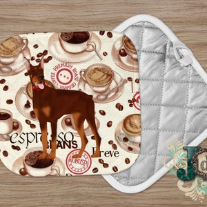 May include: A white pot holder with a quilted design and a brown and white fabric square with a brown dog and coffee cups. The fabric square has the text "espresso beans" and "robusta" on it.