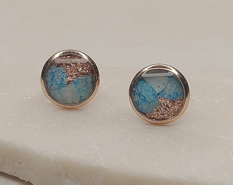 Delicate rose gold stud earrings with blue petals, gift idea for her