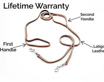 May include: A brown Latigo leather dog leash with two handles and two metal clasps. The leash is labeled "Lifetime Warranty" and is designed for durability and control during walks. The leash is made of high-quality leather.