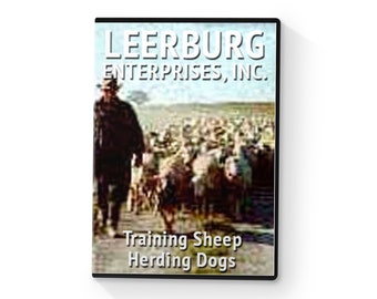 May include: A VHS video cassette with a black and white image of a man herding sheep with dogs. The text on the cassette reads "Leerburg Enterprises, Inc. Training Sheep Herding Dogs."