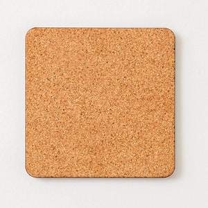 May include: A square cork board with a brown frame.