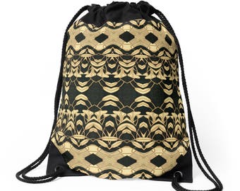 May include: Black drawstring backpack with a repeating geometric pattern in gold and tan. The pattern is set against a dark background. The bag has black drawstrings and a black base.