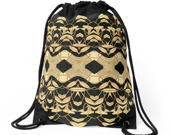 May include: A black drawstring bag with a gold and black geometric pattern. The pattern features a repeating design of leaves and diamonds.