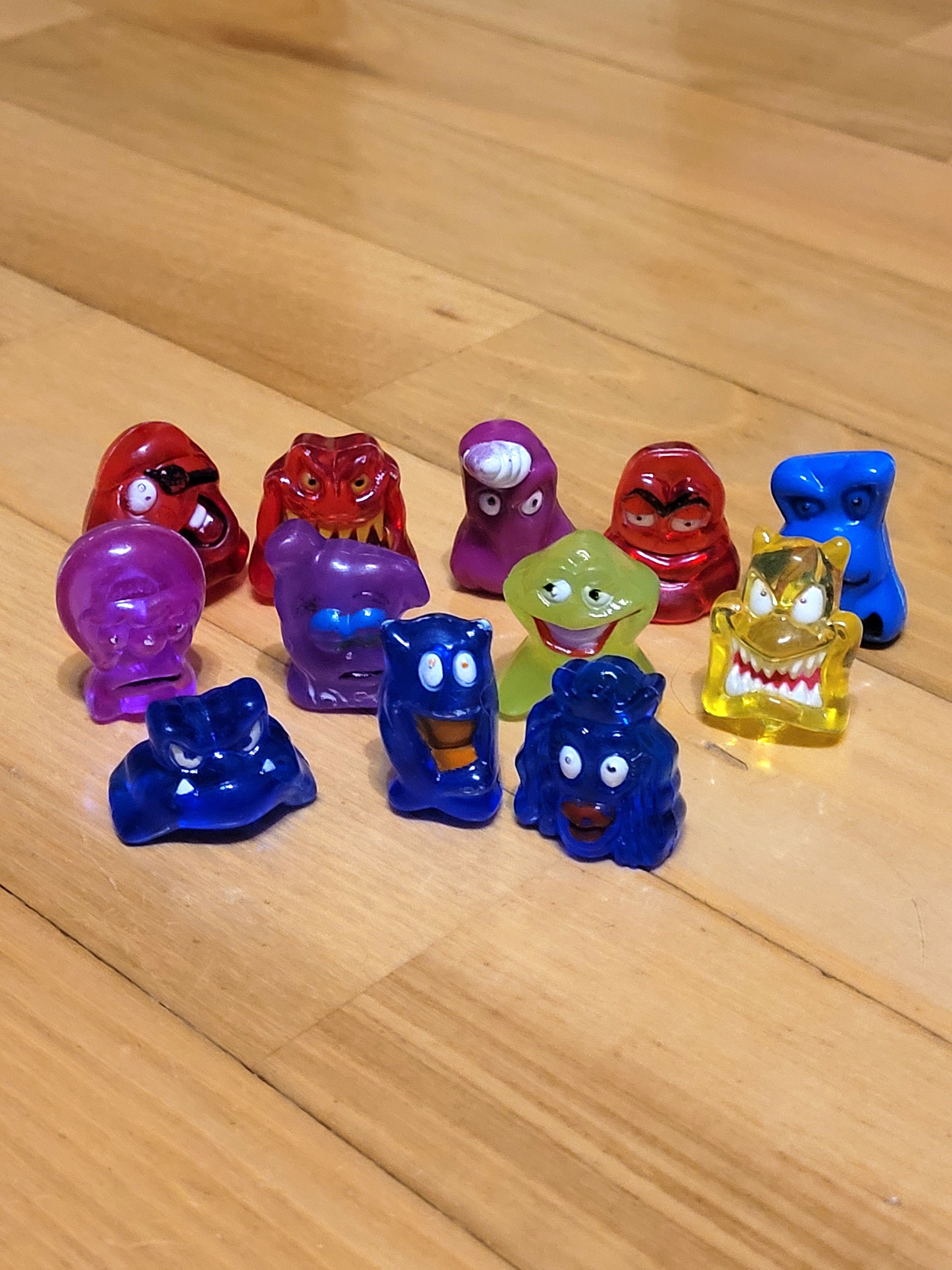 Set of 12 Sheer Dracco Heads Crazy Bones Gogos Multi Color