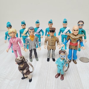 Kies een 3,5" Thunderbirds-figuur van Matchbox, ©1992 ITC Ent. Grp. Ltd. beeldje speelgoed plastic pop cartoon held tv-show filmpersonage Tracy