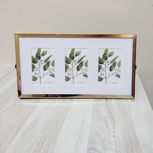 Marco de metal dorado con 3 aberturas rectangulares para fotos, cubierta de cristal, mini cuadro de pared para fotos, montaje triple minimalista.