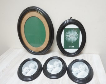 Set of 5 oval black bakelite like convex glass frame for photo portrait picture, wall hanging beveled early plastic bubble round photography