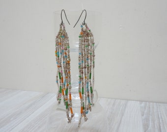 Seed bead tassel handmade dangle earrings, vintage fringe jewelry, retro boho multi color cluster clear glass orange green blue tube peacock