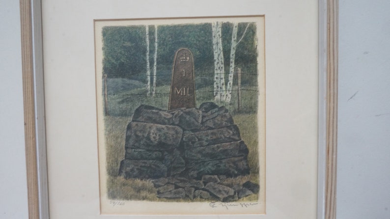 May include: A vintage woodblock print of a stone pile with a brown sign that reads "1 MIL" in a forest setting. The print is signed and numbered.