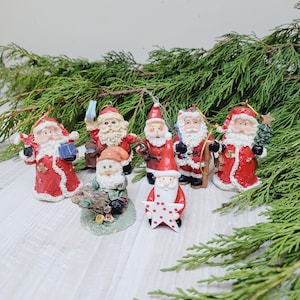 Set of 7 small resin Santa, Vintage Christmas hanging ornaments dolls, figurine figure made in Germany