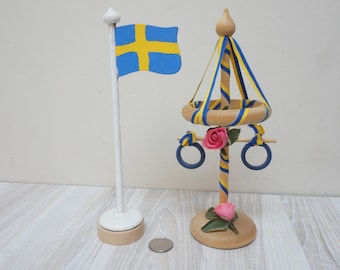 Wählen Sie den schwedischen Mittsommer-Maibaum, den Kranz der Fahnenstange auf Ständerhalter, die Ringverzierungen der Tischplatte, die in Schweden Skandinavisch hergestellt werden