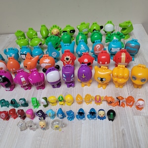 Wählen Sie Gogo's Crazy Bones Mega + Mini Metropolis Figur, Jumbo Big Box Gogos Kunststoff Kinder kleine Miniatur Evolution Fusion Serie 1