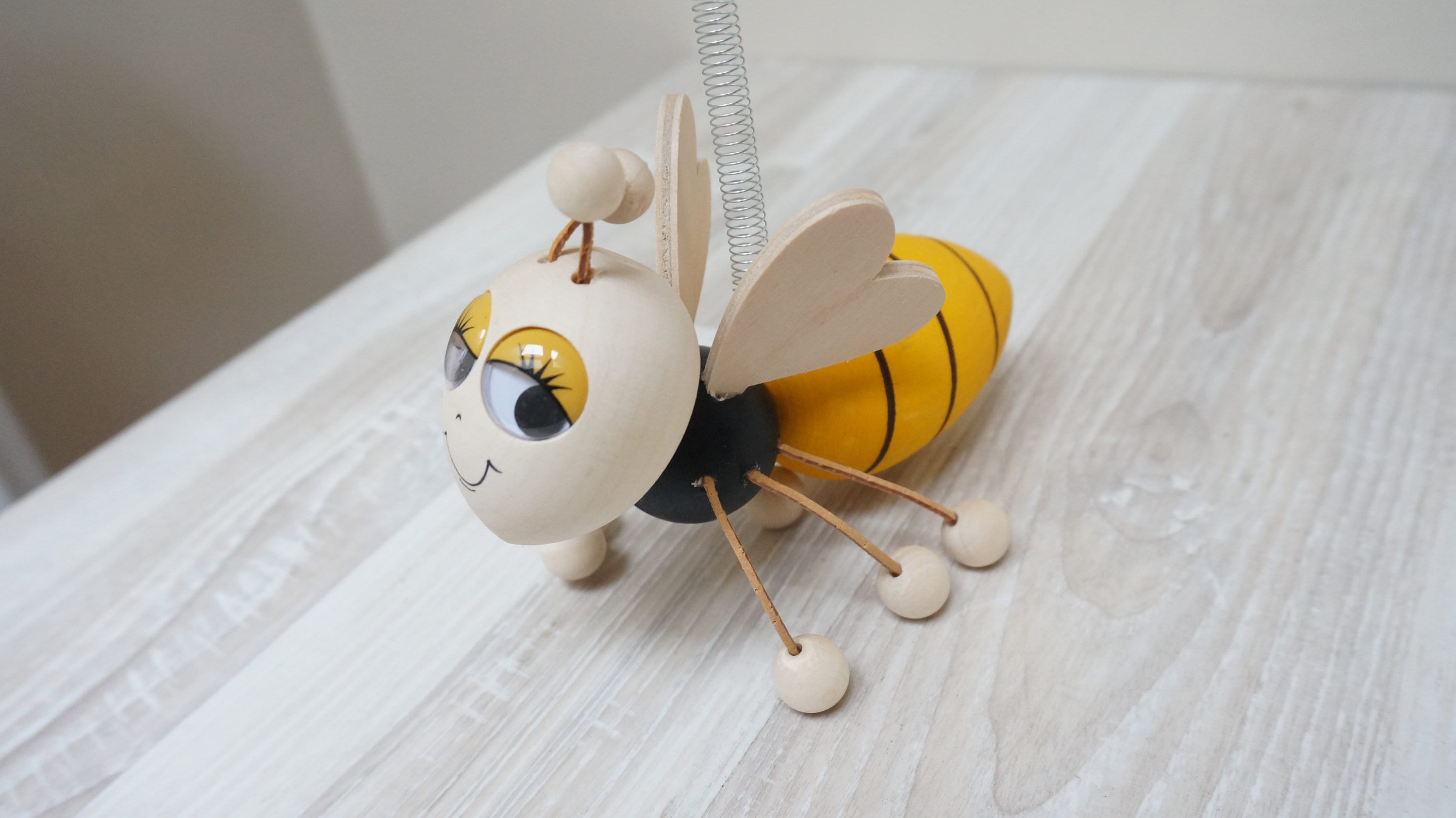 Jumping Bee Wooden Doll on a Spring 6 Inches Jumping Bee Wooden Doll on a Spring 6 Inches
