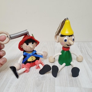 Choose bouncy wooden Pinocchio doll on spring, kitchen Halloween puppet hanging ornament jumping marionette Buratino figurine nursery room