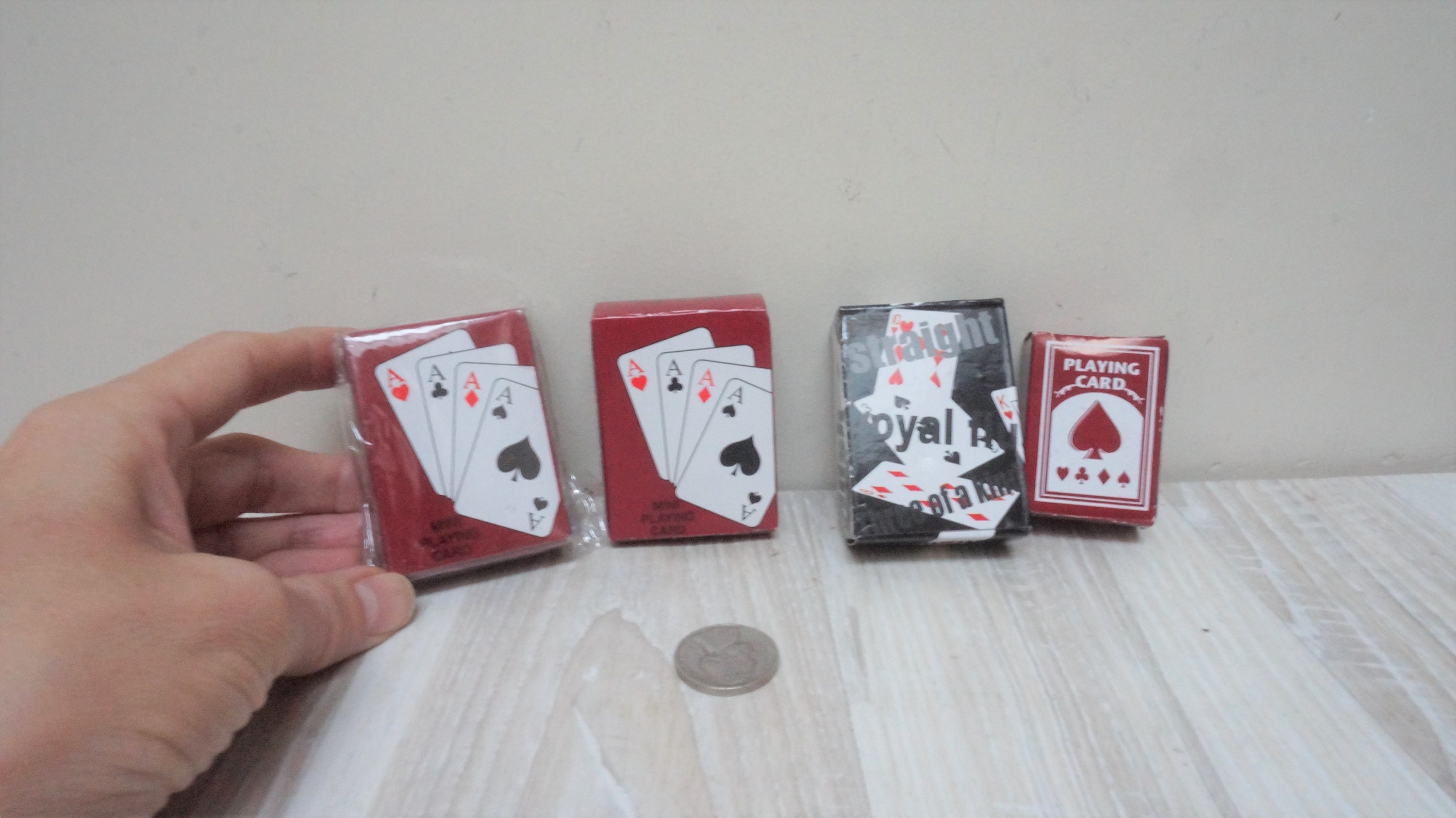 Vintage doll-size miniature toy playing poker cards