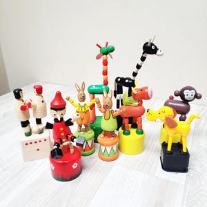 Wooden push button Easter rabbit giraffe horse dog bunny puppet marionette doll, toy Figurine collapsible collapsing Jumping animal plastic