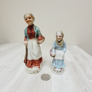 Set of 2 bisque porcelain old lady figurine made in Taiwan; woman with basket statuette, Ceramic figure in French Santon style sculpture lot
