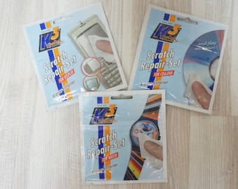 10 confezioni di K3 lucidante per CD DVD, orologi, celle, console, quadranti in plastica, riparazione graffi per display, panno per la pulizia, detergente tedesco di Kratzer-Entferner