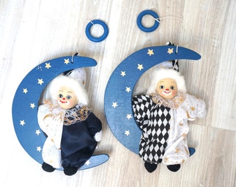 Set of 2 clown on wooden moon, German bisque porcelain head doll, stuffed harlequin figurine mobile, retro made in Germany hanging ornament