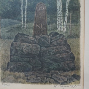 May include: A vintage woodblock print of a stone marker with a crown and the text "1 MIL" in a forest setting. The print is numbered 59/100.