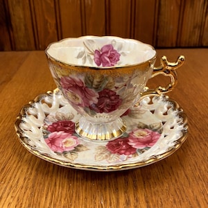 Taza de té y platillo perforado Shafford Lusterware: rosas rosadas decoradas a mano
